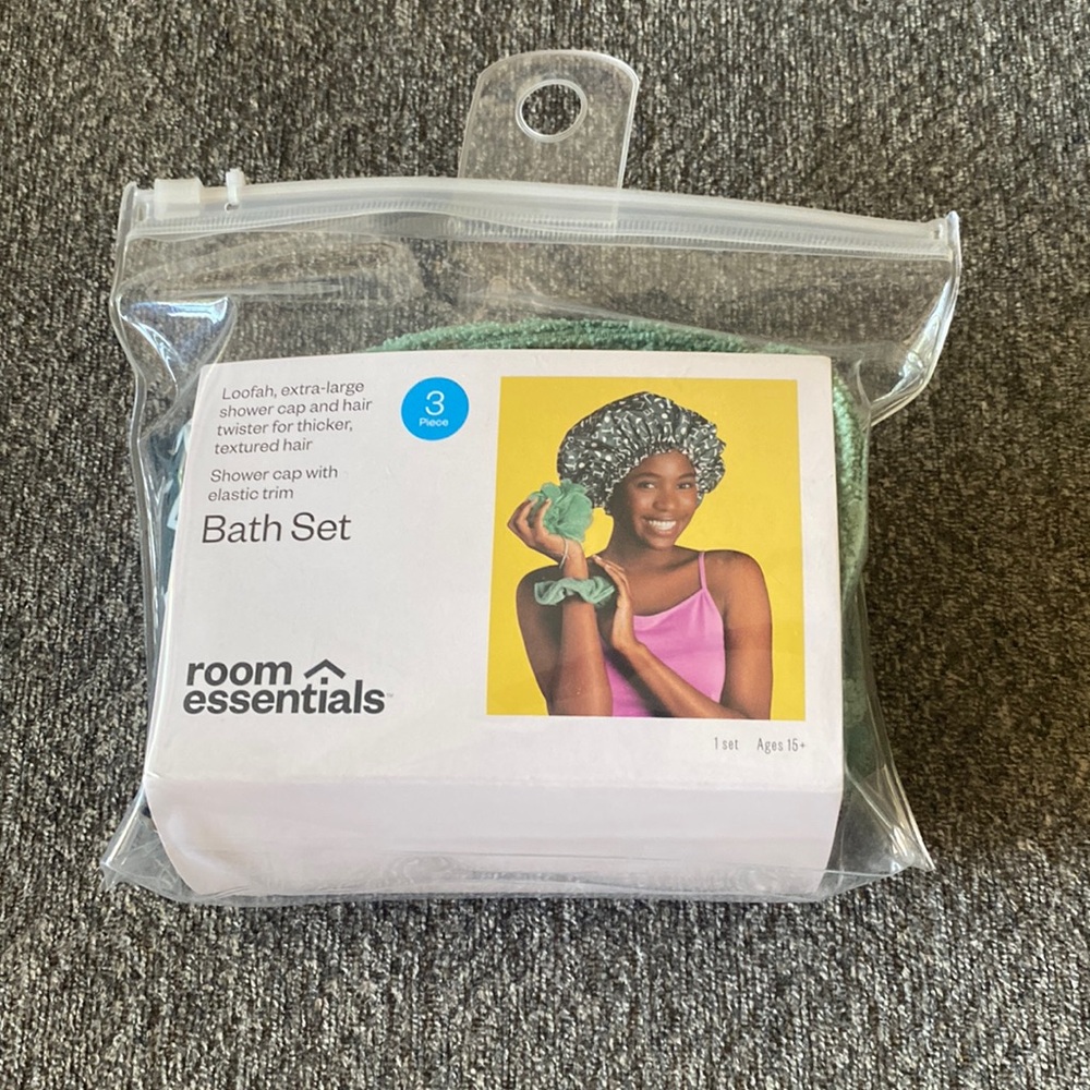 Bath set includes (loofah, extra large shower cap and hair twist). New in pkg.